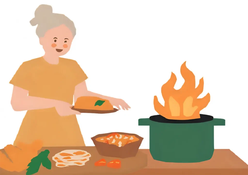 他に気をとられて、天ぷら油が異常加熱して焦っている60代女性