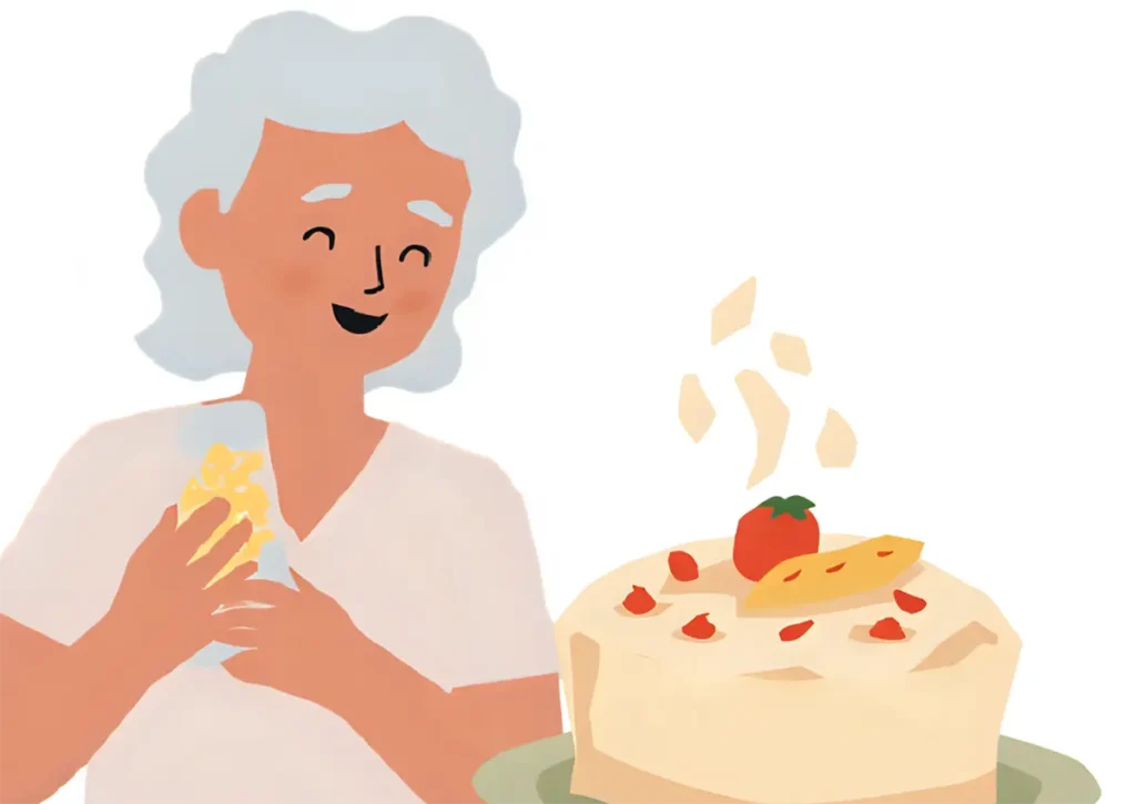 誕生日を祝ってもらって喜んでいる60代女性