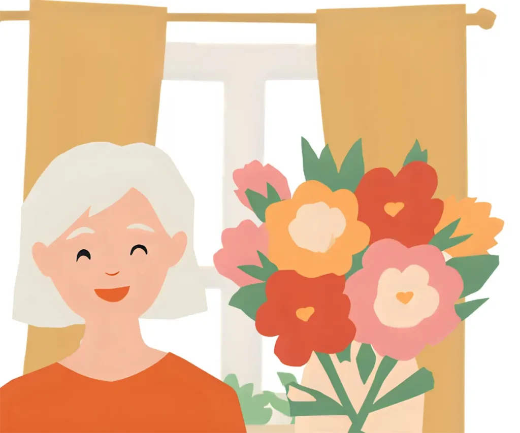 花束を自分の誕生日にもらって喜んでいる60代女性